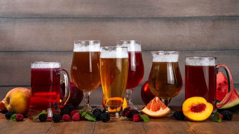 Beers in glasses with fruits