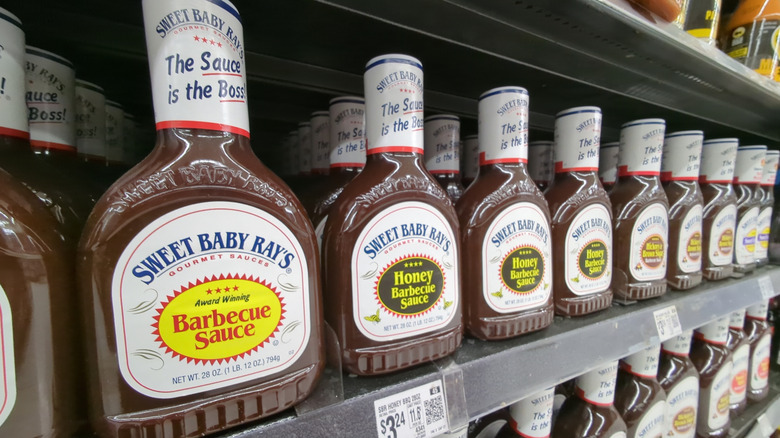 Barbecue sauce on shelves at the grocery store