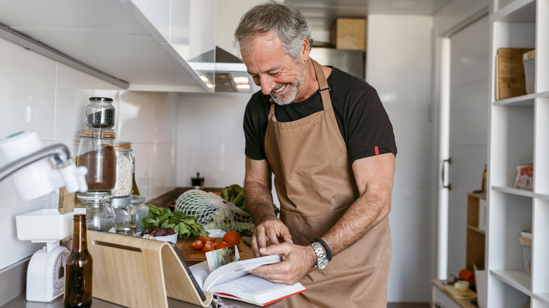 Man in kitchen preparing to cook