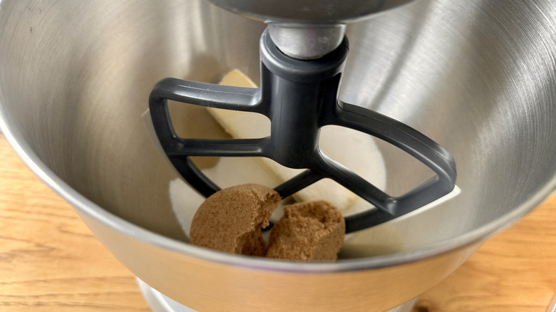 Mixing bowl with butter and sugars and paddle attachment