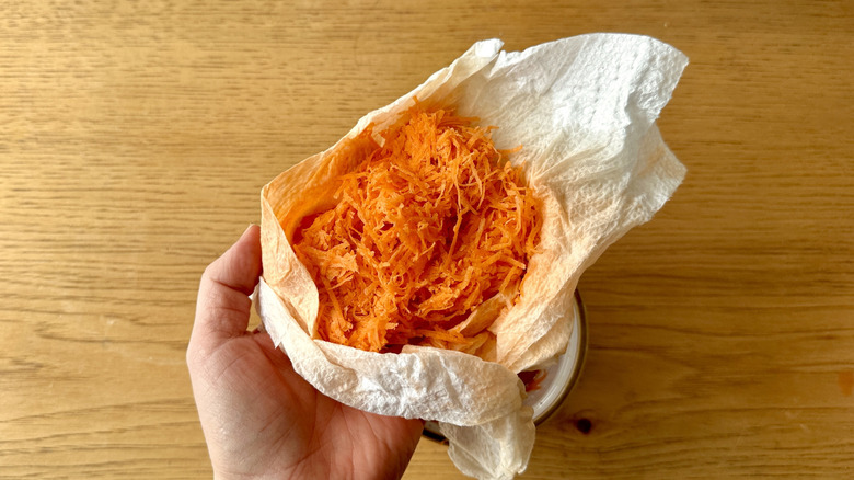 Shredded carrots in paper towel
