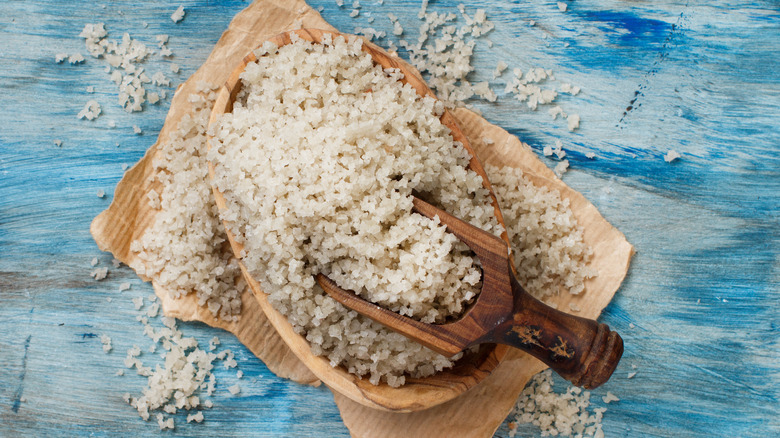 wooden bowl of grey salt