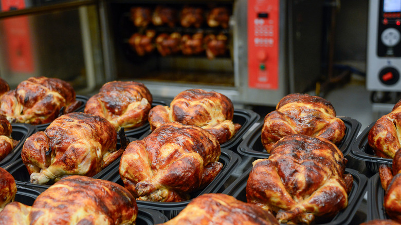 many rotisserie chickens ready for packaging