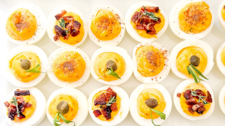 Trio of Easter (or all-year) deviled eggs closeup on platter