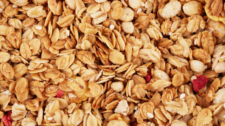 Granola cereal with sesame seeds and bits of freeze-dried strawberries