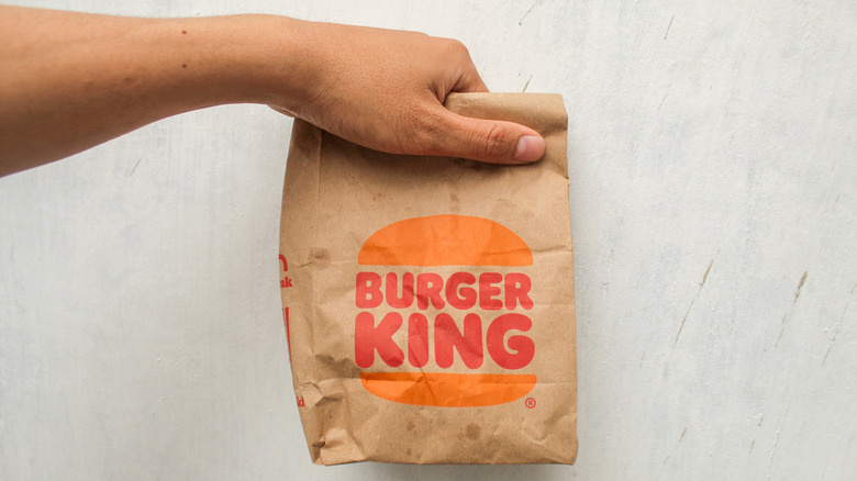 Person holding a Burger King bag