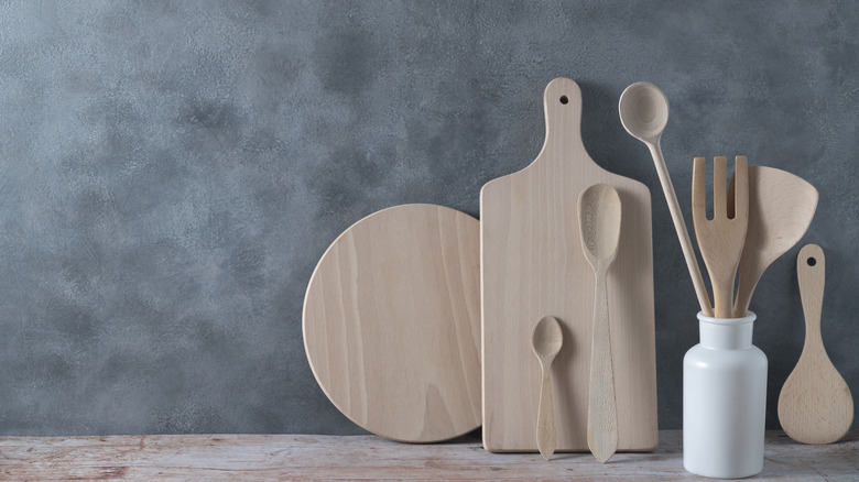 Wooden cooking tools against wall